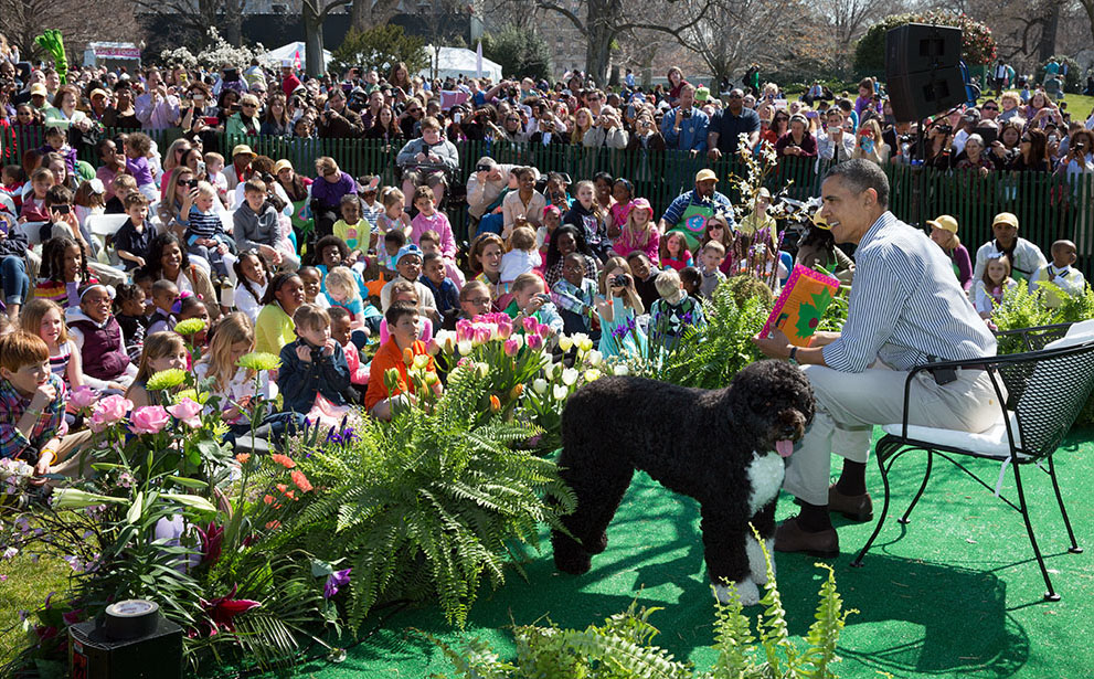 President Barack Obama, with Bo, reads to children during the 2013 Easter Egg Roll, April 1, 2013