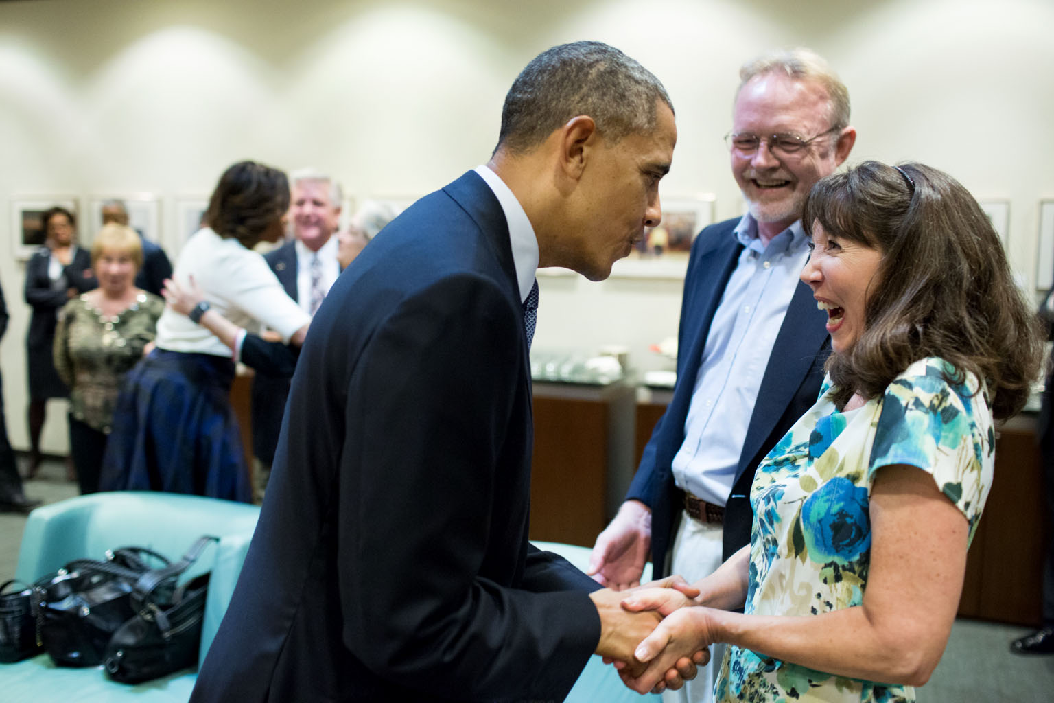 President Barack Obama and First Lady Michelle Obama meet with Texans who wrote letters to the President about the Affordable Care Act (ACA), at the Lyndon B. Johnson (LBJ) Presidential Library and Museum in Austin, Texas, April 10, 2014. Participants inc