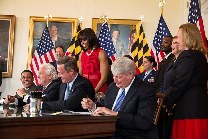 First Lady Michelle Obama watches Maryland Governor Martin O’Malley sign the Veterans Full Employment Act of 2013, April 17, 2013