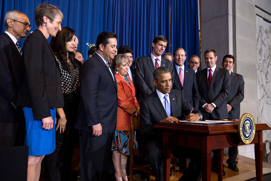 President Barack Obama signs a proclamation establishing the Organ Mountains-Desert Peaks National Monument in south-central New Mexico, at the Department of Interior in Washington, D.C., May 21, 2014.