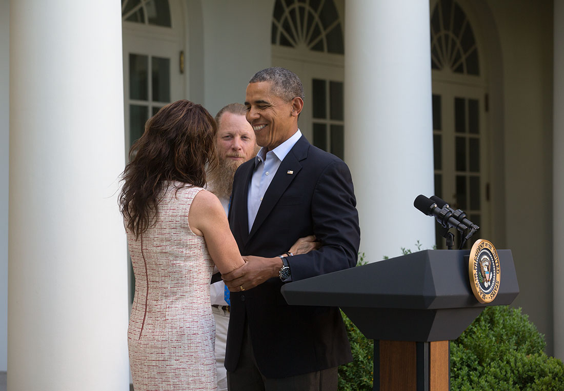 President Barack Obama hugs Jani and Bob Bergdahl, the parents of Sgt. Bowe Bergdahl