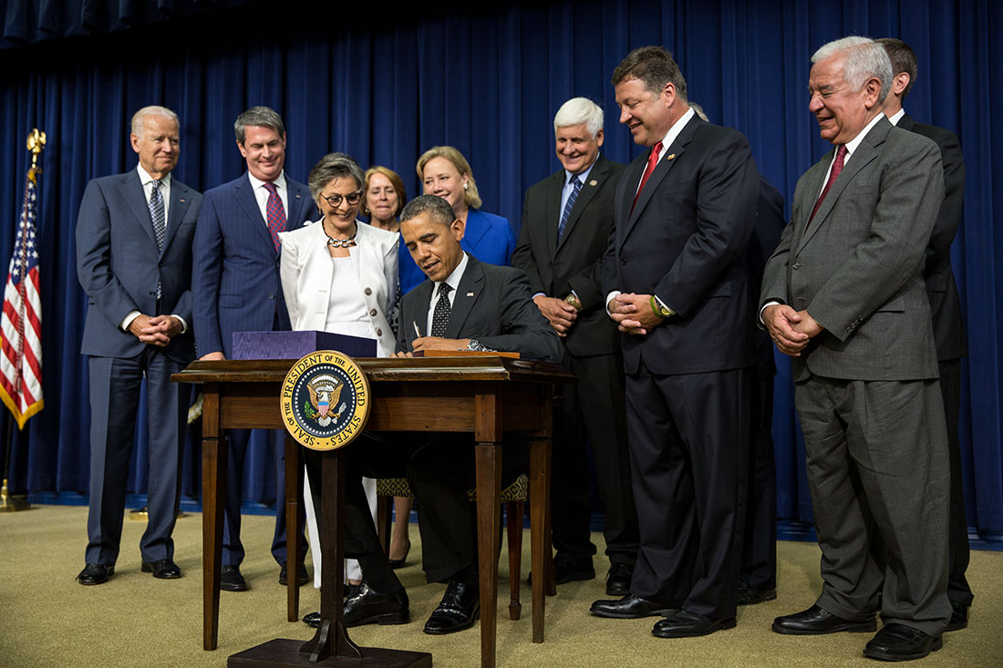 President Barack Obama signs H.R. 3080