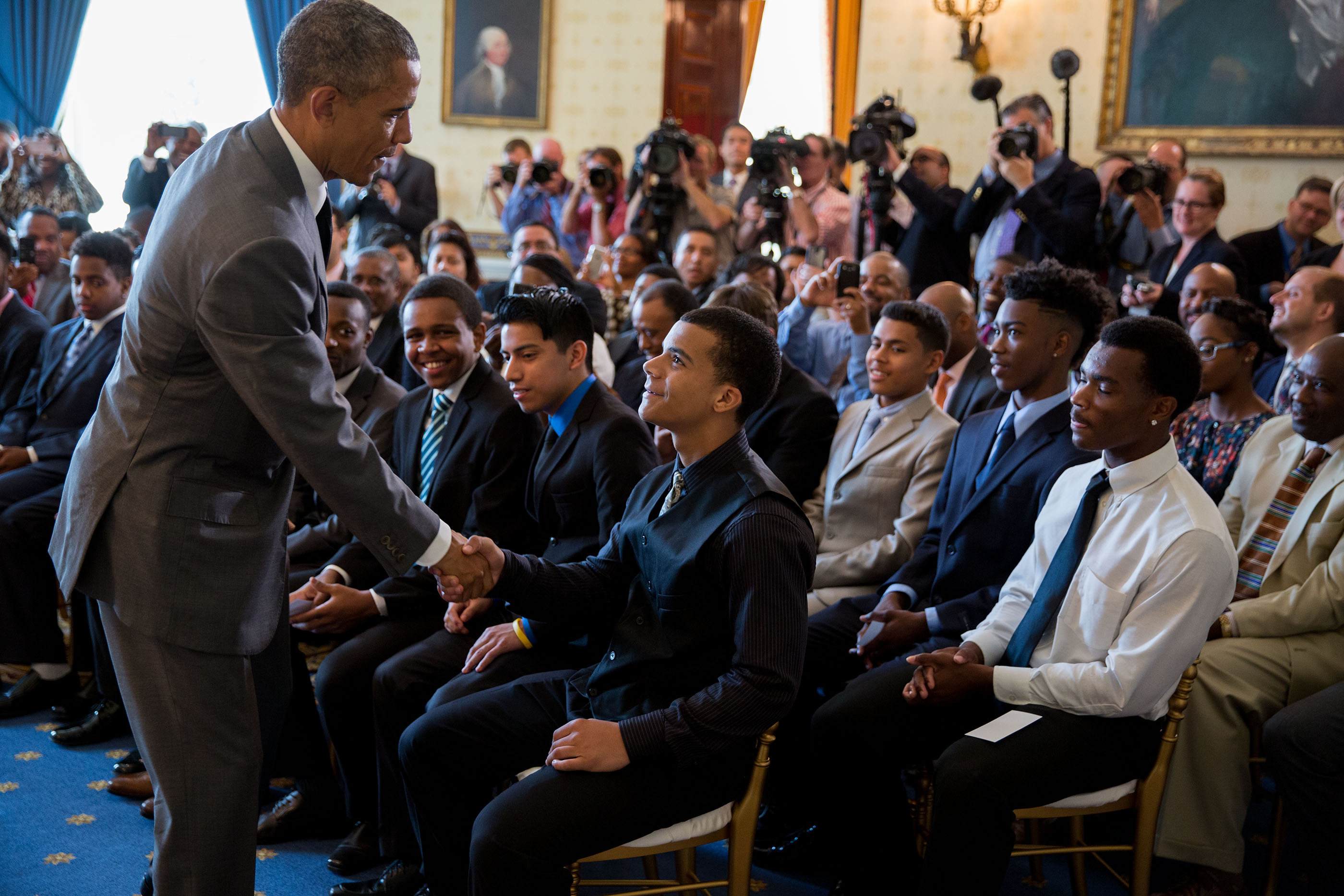 President Obama congratulates mentees following his remarks at the Mentorship and Leadership graduation ceremony