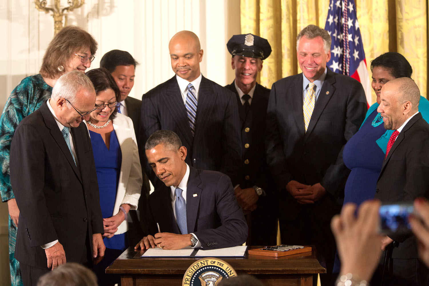 President Obama signs an executive order on further amendments to EO 11478