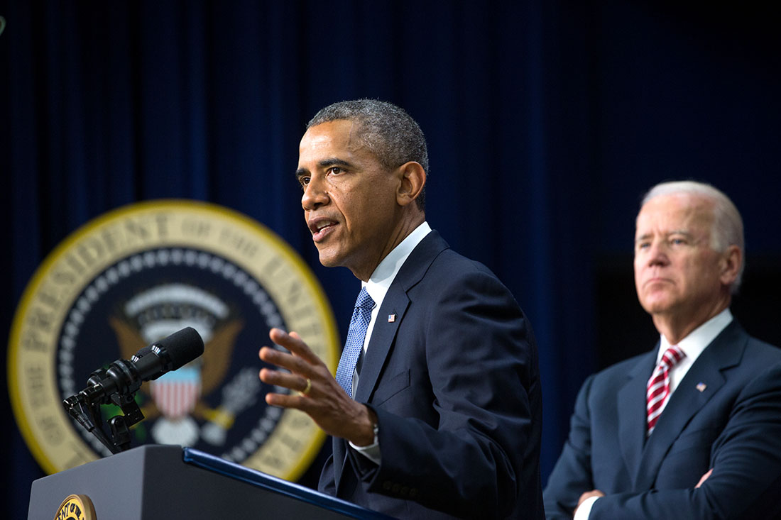 President Barack Obama, with Vice President Joe Biden, delivers remarks on job training before signing H.R. 803