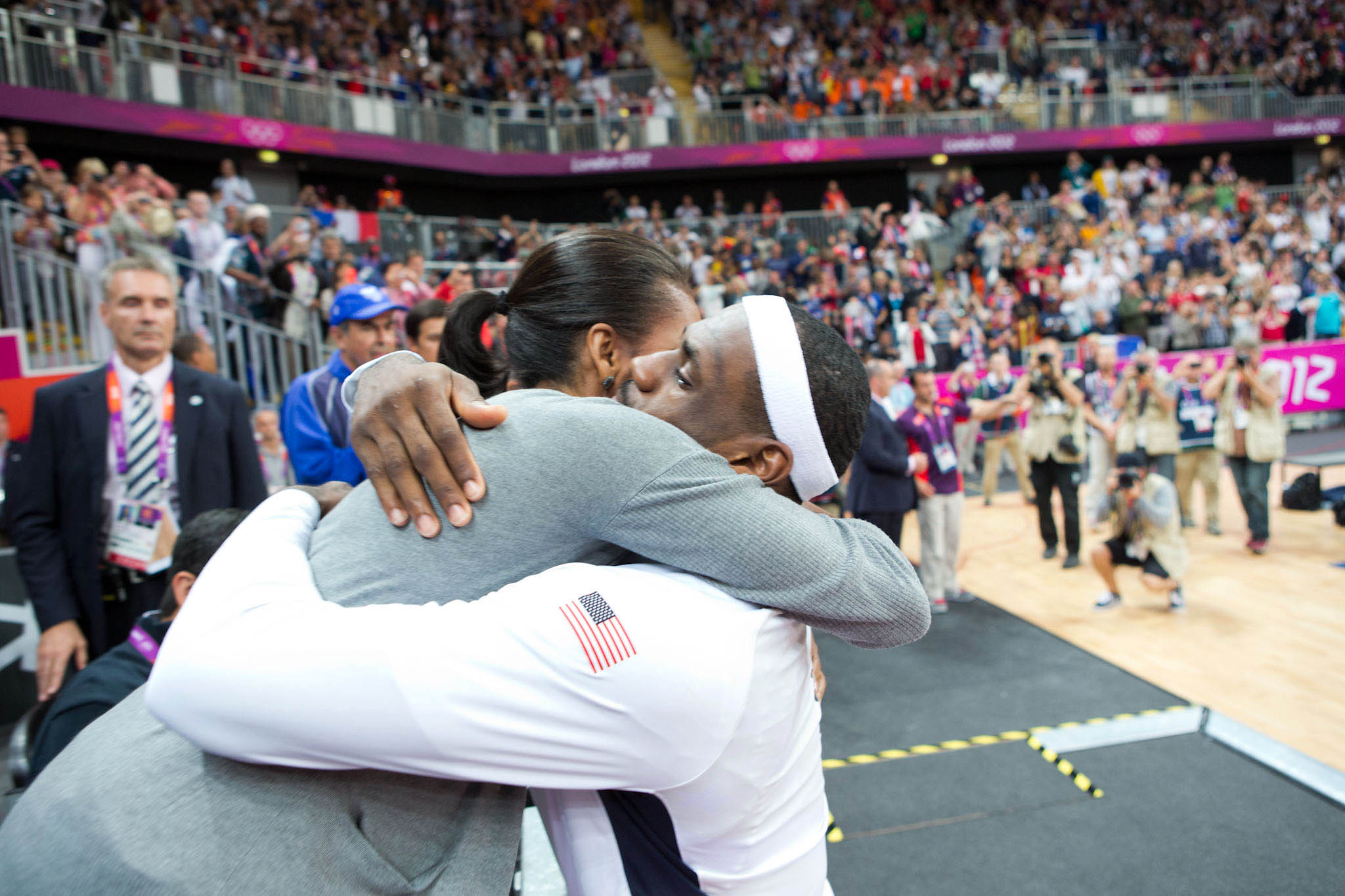 First Lady Michelle Obama Hugs LeBron James