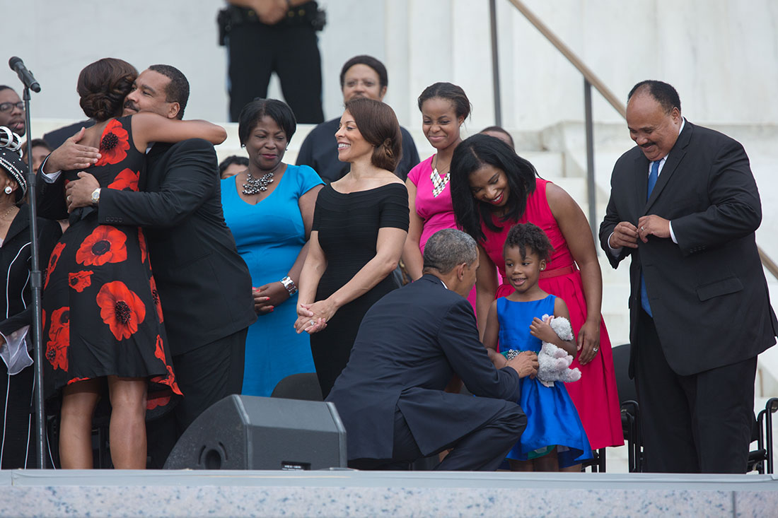 President Barack Obama and First Lady Michelle Obama greet members of the King family