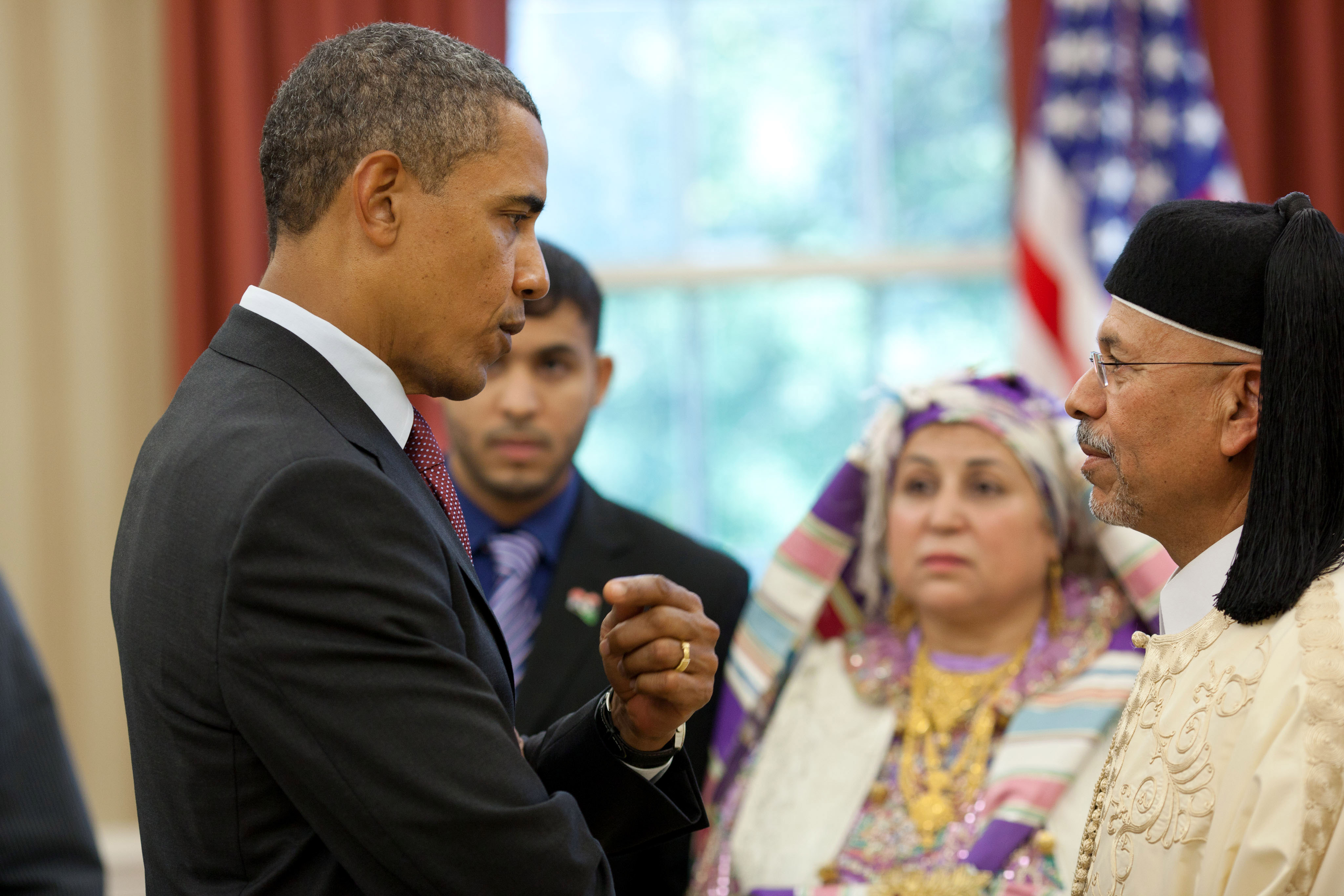 President Barack Obama talks with Ambassador Ali Suleiman Aujali of Libya 