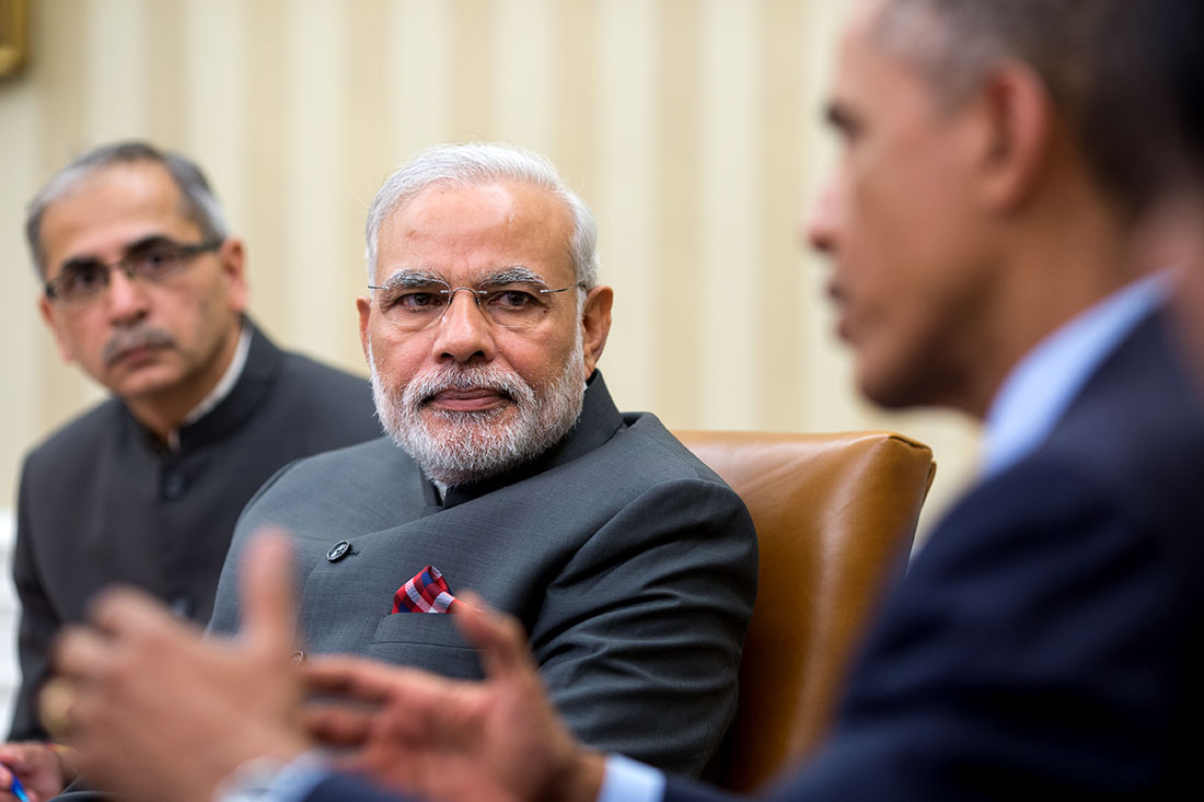 President Barack Obama talks with Prime Minister Narendra Modi of India during their bilateral meeting
