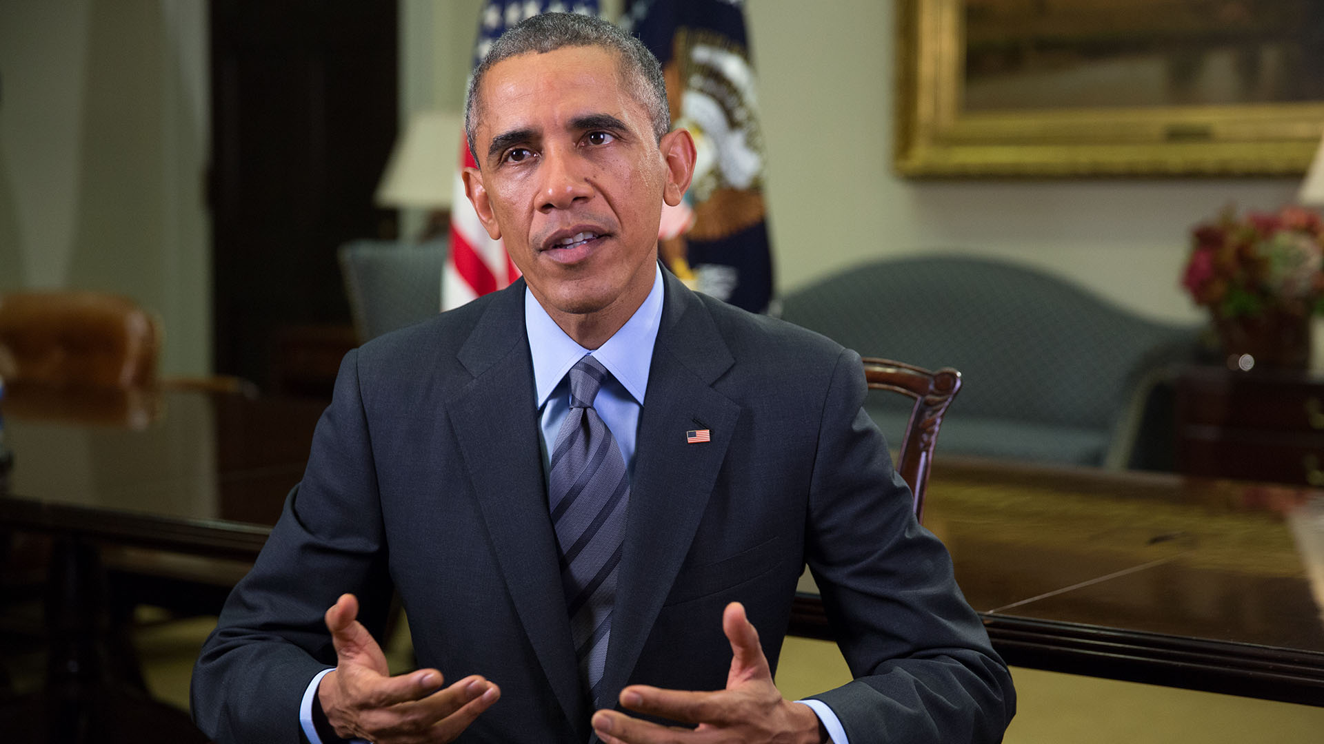 President Barack Obama tapes the Weekly Address in the Roosevelt Room of the White House, Oct. 24, 2014.