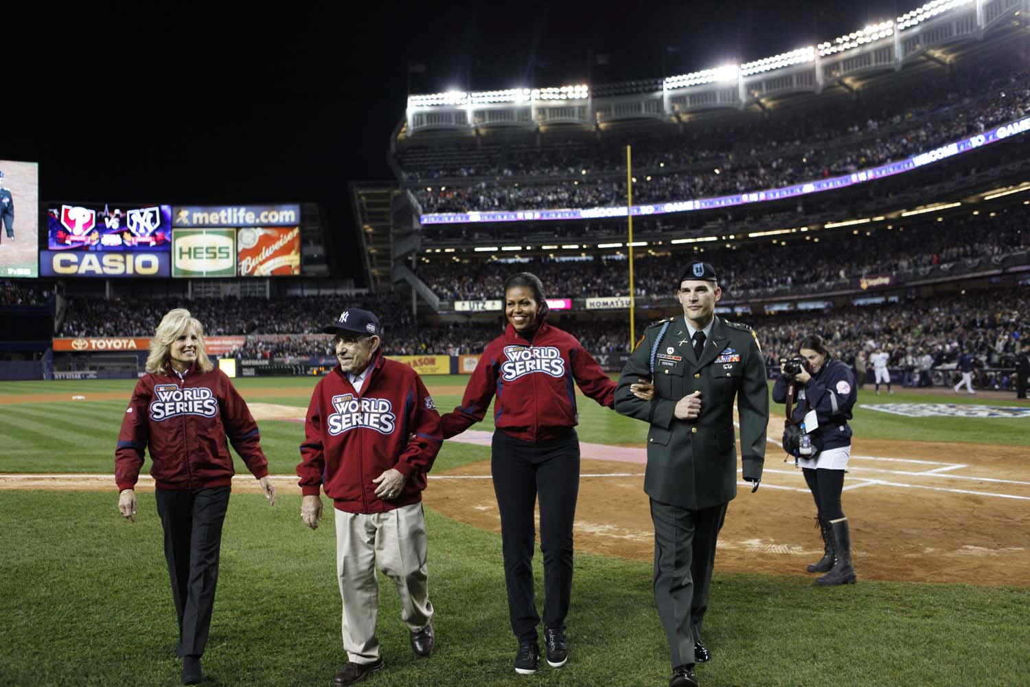 First Lady Michelle Obama and Dr. Jill Biden take to the field at Yankee Stadium