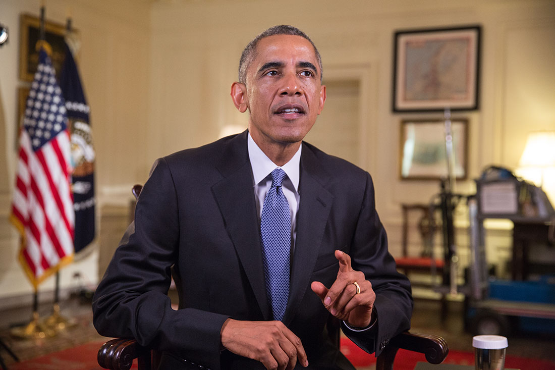 President Barack Obama tapes the Weekly Address in the Map Room of the White House, Oct. 30, 2014.