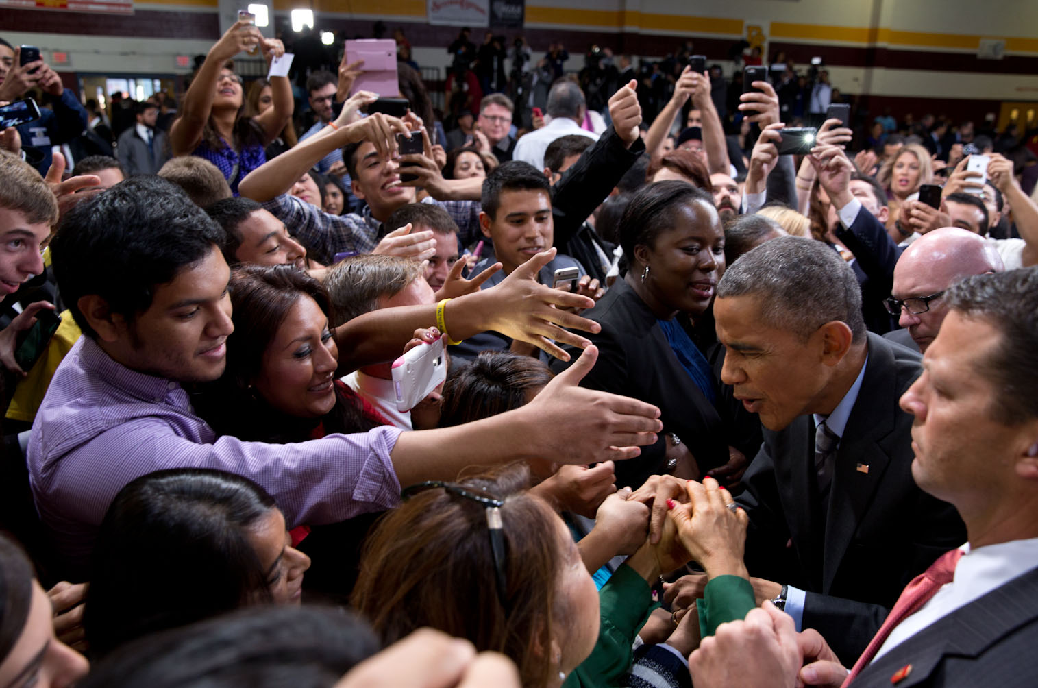 President Obama greets audience members after making remarks on immigration at Del Sol High School in Las Vegas, Nov. 21, 2014