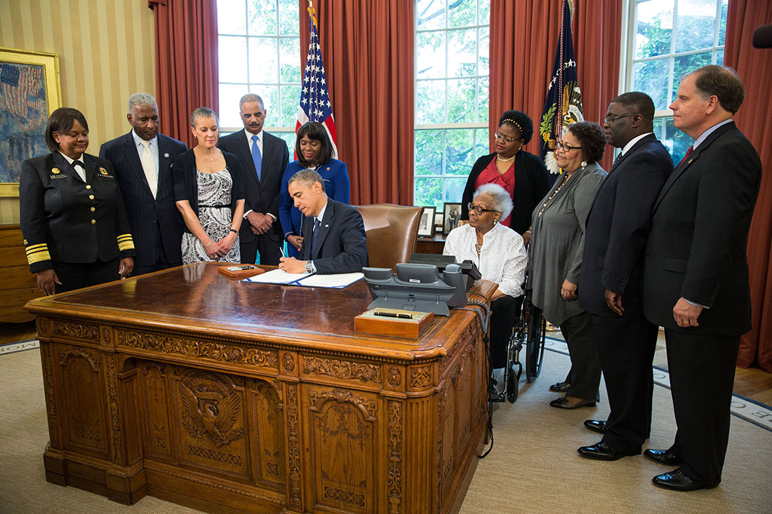 President Obama signs bill for Congressional Gold Medal for girls killed in 1963 bombing.