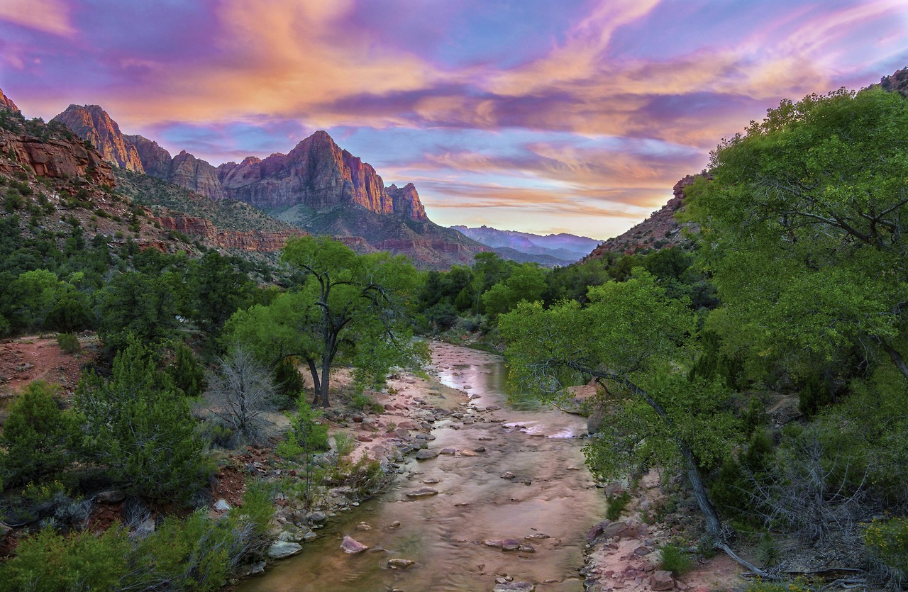 The sun sets over Zion National Park in Utah