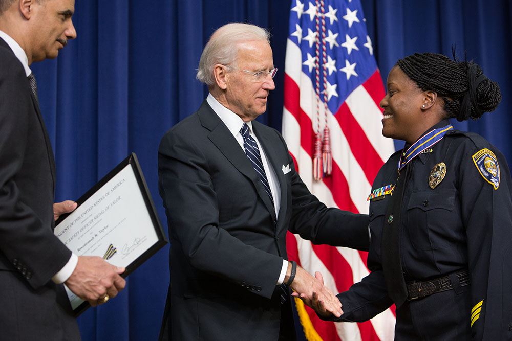 Vice President Joe Biden with Officer Reeshemah Taylor at a Medal of Valor ceremony, Feb., 20, 2013.