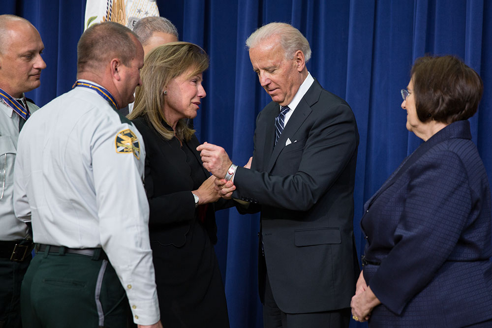 Vice President Joe Biden with Paige Baitinger at a Medal of Valor ceremony, Feb., 20, 2013.  