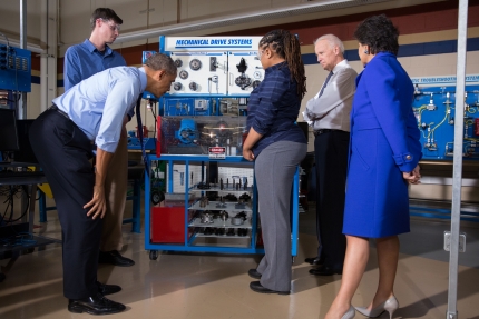 President Barack Obama, Vice President Joe Biden, and Commerce Secretary Penny Pritzker tour a classroom at the Community College of Allegheny County West Hills Center in Oakdale, Pa.