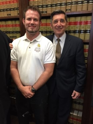 Director Botticelli with drug court graduate Donovan Simmons