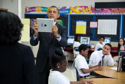 President Barack Obama records video on an iPad 