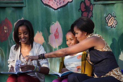 First Lady, Sasha, Malia, read "Cat in the Hat" in township