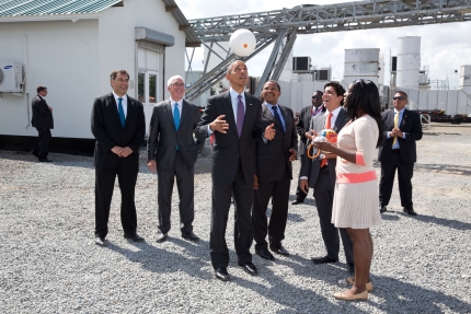 President Barack Obama tosses a Soccket ball in the air at the Ubongo Power Plant in Dar es Salaam