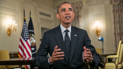 President Barack Obama tapes the Weekly Address in the State Dining Room of the White House, Aug. 8, 2014.