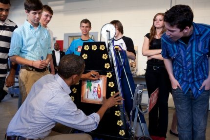 President Barack Signs "Skrappy" the Robot 