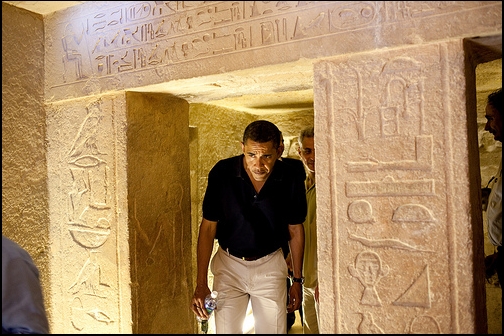 President Barack Obama ducks his head in a Pyramid