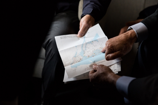 New York Mayor Bloomberg and New York Governor Cuomo Point Out Areas on a Map