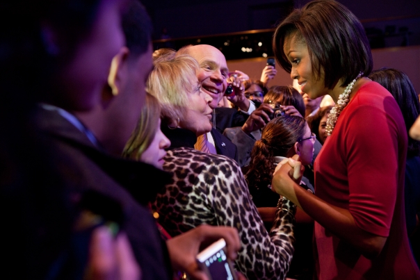 First Lady Michelle Obama greets guests at the National League of Cities