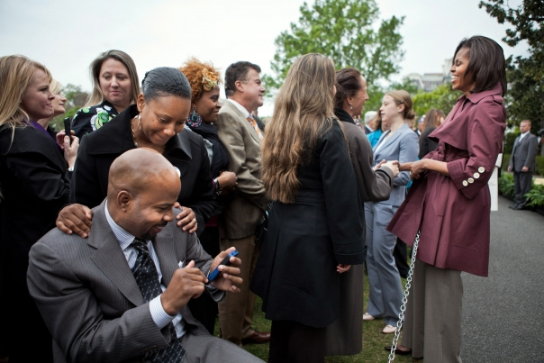 Sherman And Tammie Gillums Look At Their Pictures