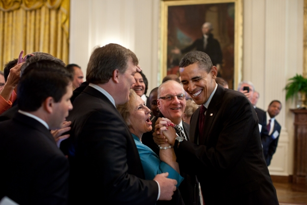 President Barack Obama greets guests during a reception for U.S. mayors 