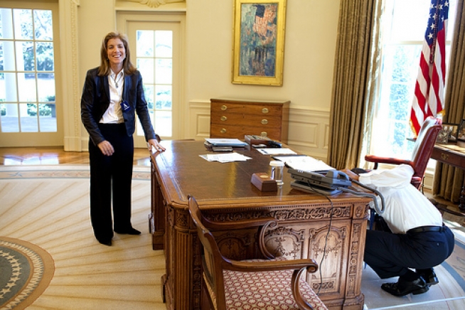 President Barack Obama Examines The Resolute Desk The White House