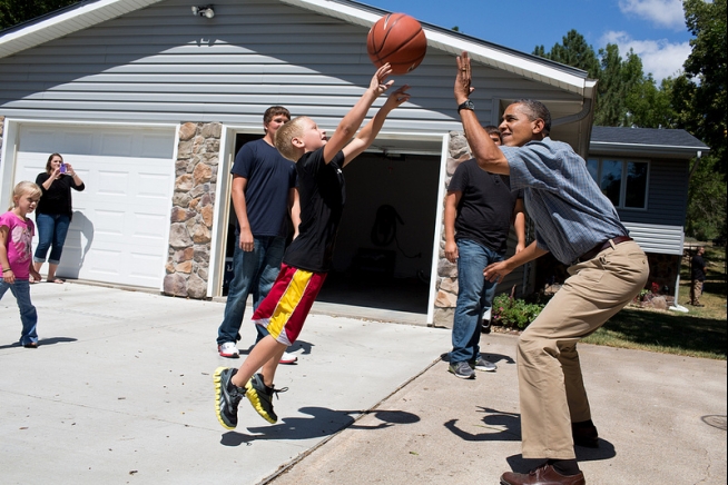 President Barack Obama plays basketball during a visit to the McIntosh farm in Missouri Valley, Iowa | The White House