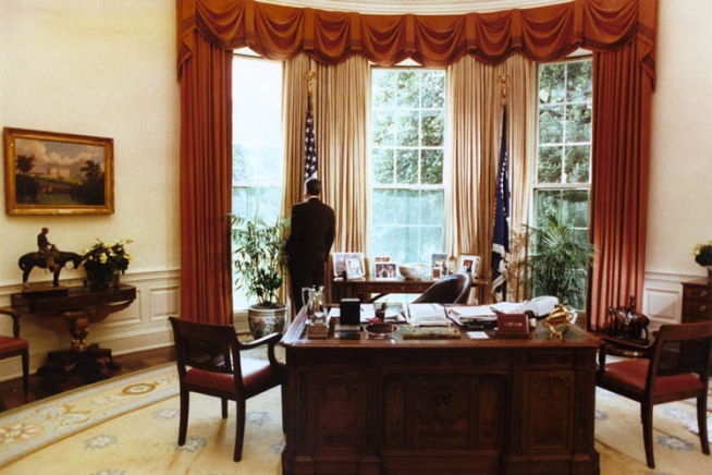 President Ronald Reagan in the Oval Office. | The White House