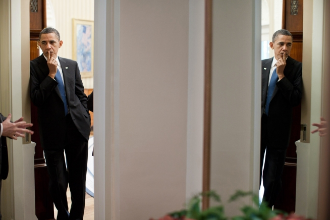 President Barack Obama Is Reflected in the Outer Oval Office Mirror ...