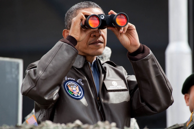President Barack Obama Uses Binoculars To View The DMZ - The White House