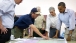 President Barack Obama Looks at a Map of Fires