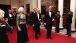 President and Mrs. Bush escort Prime Minister Mazowiecki of Poland at a State Dinner