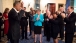 President Obama acknowledges applause from Cabinet members