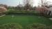 William Jefferson Clinton and Hillary Rodham Clinton play catch in the Rose Garden