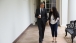 President Barack Obama walks with Personal Secretary Ferial Govashiri