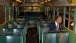 President Barack Obama sits on the Rosa Parks bus