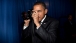 President Barack Obama takes a picture