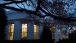 President Obama works at dusk