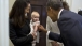 President Barack Obama greets five-month-old Davida Asen