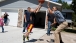 President Barack Obama plays basketball during a visit to the McIntosh family farm in Missouri Valley, Iowa