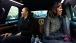 President Barack Obama and First Lady Michelle Obama ride in the inaugural parade