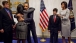 President Barack Obama And First Lady Michelle Obama Greet The Green Family